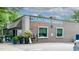 Exterior view of Dancing Goats Coffee Bar featuring a modern facade with inviting signage and outdoor seating at 104 Powell Cv, Decatur, GA 30030