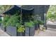 The Deer and The Dove restaurant with an inviting exterior, lush greenery, and charming outdoor seating area at 104 Powell Cv, Decatur, GA 30030