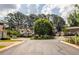 Charming suburban street showcasing well-maintained homes and mature trees, ideal for a peaceful neighborhood setting at 104 Powell Cv, Decatur, GA 30030