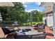 Spacious back deck with stylish outdoor seating overlooking the lush backyard at 1213 Grande Vw, Loganville, GA 30052