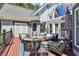 Inviting back deck features stylish seating and decor for outdoor entertaining at 1213 Grande Vw, Loganville, GA 30052