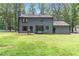 Spacious backyard with a patio, perfect for outdoor entertaining and relaxation at 155 N Fayette Dr, Fayetteville, GA 30214