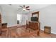 Large bedroom with wood floors, and a view into the connected bath at 155 N Fayette Dr, Fayetteville, GA 30214