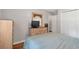 Bedroom featuring a bed, wood floors, neutral paint, and a closet at 155 N Fayette Dr, Fayetteville, GA 30214