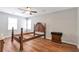Spacious bedroom with wood-look flooring and plenty of natural light at 155 N Fayette Dr, Fayetteville, GA 30214