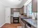 Updated kitchen featuring modern cabinets, countertops, and a double oven stove at 155 N Fayette Dr, Fayetteville, GA 30214