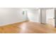 Bright, spacious basement features a window and hardwood floors at 4049 Northlake Creek Cv, Tucker, GA 30084