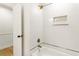 Beautiful bathroom featuring white subway tile and bronze fixtures at 4049 Northlake Creek Cv, Tucker, GA 30084