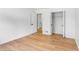 Bedroom featuring hardwood floors and a closet at 4049 Northlake Creek Cv, Tucker, GA 30084