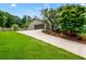 Charming home with a well-maintained lawn, inviting driveway, and a two-car garage at 4049 Northlake Creek Cv, Tucker, GA 30084
