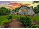 The home features a well-maintained lawn and thoughtful landscaping accentuating the architecture at 4049 Northlake Creek Cv, Tucker, GA 30084