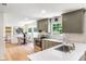 Well-lit kitchen and breakfast nook featuring modern appliances and a bright, airy atmosphere at 4049 Northlake Creek Cv, Tucker, GA 30084