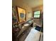 Well-lit bathroom featuring a granite countertop and tiled floor at 4147 Scofield Pl, Stonecrest, GA 30083