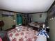 Spacious bedroom featuring two beds, wall art, and closet with open shelving at 4147 Scofield Pl, Stonecrest, GA 30083