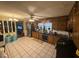 Functional kitchen featuring tile flooring and ample cabinet space at 4147 Scofield Pl, Stonecrest, GA 30083