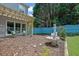 Cozy backyard with a pergola covered patio and decorative water fountain at 7325 Brookwood Way, Cumming, GA 30041