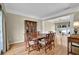 Elegant dining room featuring hardwood floors, adjacent to formal living area at 7325 Brookwood Way, Cumming, GA 30041