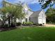 Charming home exterior featuring a well-manicured lawn, two-car garage, and lovely curb appeal at 7325 Brookwood Way, Cumming, GA 30041