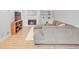 Comfortable living room with fireplace and plush gray sectional at 366 Blackland Nw Rd, Atlanta, GA 30342