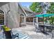 Home exterior showing the back deck and mature trees at 605 Linkside Hollow, Alpharetta, GA 30005