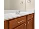 Well-lit bathroom with a large mirror and wood cabinets at 84 Mount Vernon Cir, Atlanta, GA 30338