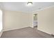 Bedroom with view to bathroom and plush neutral carpet at 84 Mount Vernon Cir, Atlanta, GA 30338