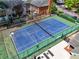 Aerial view of a community tennis court with lounge chairs at 84 Mount Vernon Cir, Atlanta, GA 30338