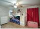 Bedroom with a bunk bed, wall art, and red curtains at 325 Paces Dr, Lithia Springs, GA 30122