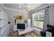 Bright home office with modern desk, shelving, and ample natural light at 325 Paces Dr, Lithia Springs, GA 30122
