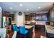 Stylish kitchen boasts granite countertops, stainless steel appliances, and a functional center island with seating at 325 Paces Dr, Lithia Springs, GA 30122