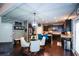 Open kitchen/dining area features stainless appliances and a breakfast bar plus is open to a living space at 325 Paces Dr, Lithia Springs, GA 30122