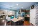 Open kitchen/dining area features stainless appliances and a breakfast bar plus is open to a living space at 325 Paces Dr, Lithia Springs, GA 30122