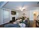 Comfortable living room with fireplace, dark wood floors, and natural light at 325 Paces Dr, Lithia Springs, GA 30122