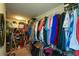 Well-organized walk-in closet equipped with rods and shelving for optimal storage at 325 Paces Dr, Lithia Springs, GA 30122