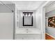 Bright bathroom featuring a shower-tub combo and a classic vanity with open lighting at 4157 Berkeley Nw Lndg, Kennesaw, GA 30144