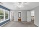 Spacious bedroom with carpet, ceiling fan, and ample natural light at 4157 Berkeley Nw Lndg, Kennesaw, GA 30144