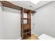 Walk-in closet with custom shelving providing ample storage and organization at 4157 Berkeley Nw Lndg, Kennesaw, GA 30144