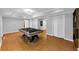 Spacious finished game room with an expansive billiard table at 4157 Berkeley Nw Lndg, Kennesaw, GA 30144