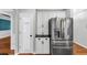 Bright kitchen featuring stainless steel appliances, white cabinets, and a walk-in pantry at 4157 Berkeley Nw Lndg, Kennesaw, GA 30144