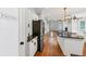 Bright, open kitchen featuring stainless steel appliances, a large island and walk in pantry at 4157 Berkeley Nw Lndg, Kennesaw, GA 30144