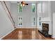 Bright living room with fireplace and large windows at 4157 Berkeley Nw Lndg, Kennesaw, GA 30144