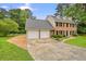 Charming two-story brick home with manicured front yard at 2801 Holly Oaks Dr, Marietta, GA 30062