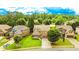 Aerial view of a beautiful home and lush green lawn with mature trees at 4978 Arborview Pkwy, Acworth, GA 30101