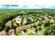 Expansive aerial shot showcasing the lush, green neighborhood with mature trees surrounding the homes at 4978 Arborview Pkwy, Acworth, GA 30101