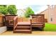A charming backyard deck with stairs adds an appealing outdoor living space at 4978 Arborview Pkwy, Acworth, GA 30101