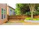 A backyard features a manicured garden and a wooden fence at 4978 Arborview Pkwy, Acworth, GA 30101