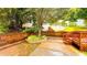 Backyard features a well-maintained garden area at 4978 Arborview Pkwy, Acworth, GA 30101