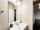 Bathroom featuring a large mirror over the sink and a view of the stairway at 4978 Arborview Pkwy, Acworth, GA 30101