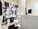 Modern bathroom featuring a shower-tub combo with stylish black and gray shower curtain at 4978 Arborview Pkwy, Acworth, GA 30101