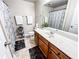 Stylish bathroom with wood vanity, granite countertop, and modern fixtures at 4978 Arborview Pkwy, Acworth, GA 30101